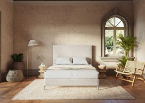 Canapé Supreme de Sonpura tapizado con patas de diseño en metal cromado de calidad